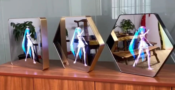 전문자필 3D는 LED 라이트를 광고하기 위한 표시형 홀로그램 키오스크를 반영합니다